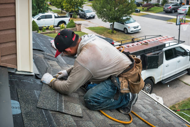 Professional Roof Replacement technician working in Tarrytown, NY